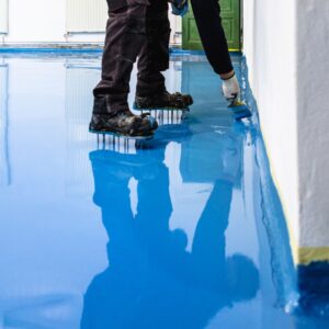 A contractor applying coating