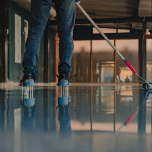 A contractor applying coating