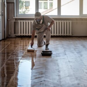 A contractor applying coating