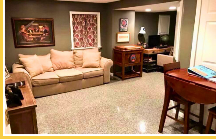 Transformed basement area with epoxy flooring