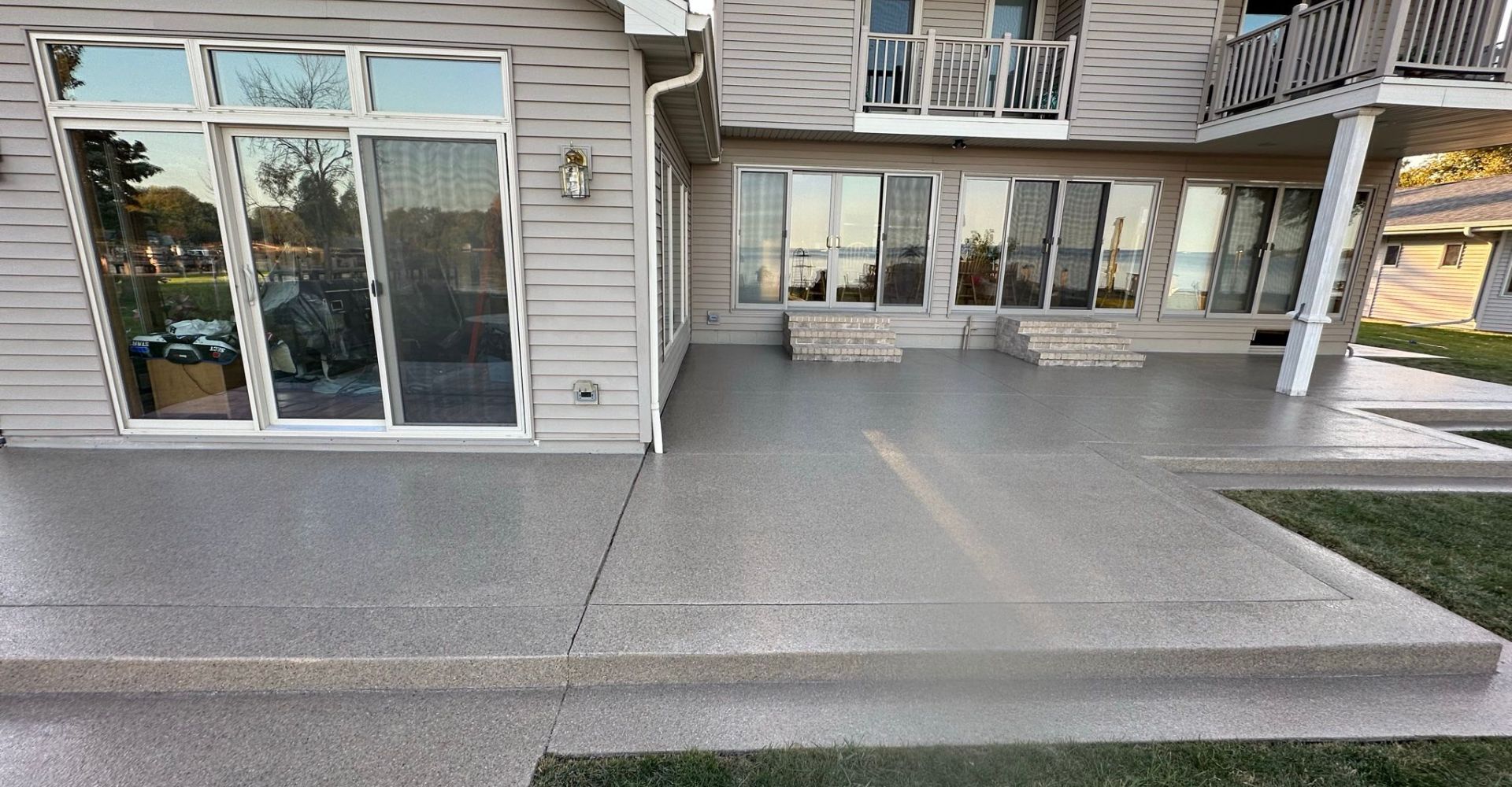 Polyurea concrete protecting an outdoor space