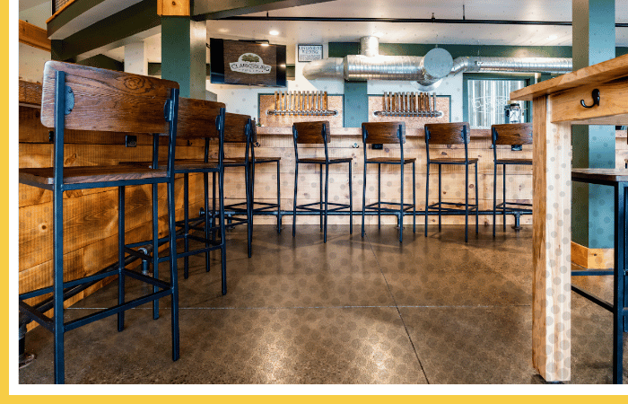 High-performance Polyurea floor coating in commercial bar setting | Easy-to-clean restaurant and hospitality flooring