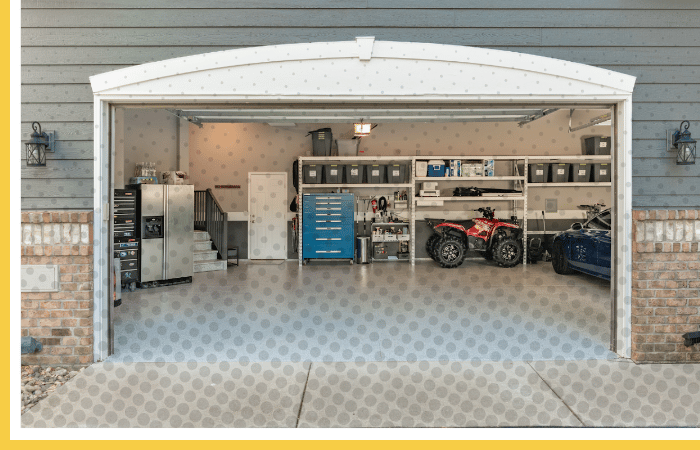 Organized residential garage with Polyurea floor coating | Seamless floor under storage cabinets and recreational vehicles