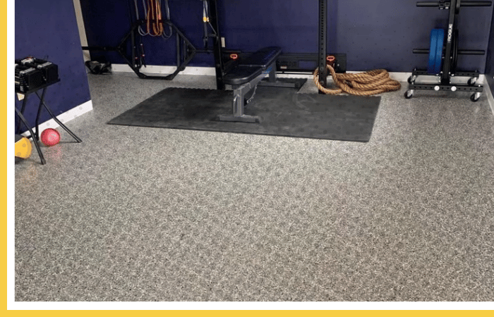 Impact-resistant Polyurea floor coating in a home gym or fitness studio | Durable flooring for weights and exercise
