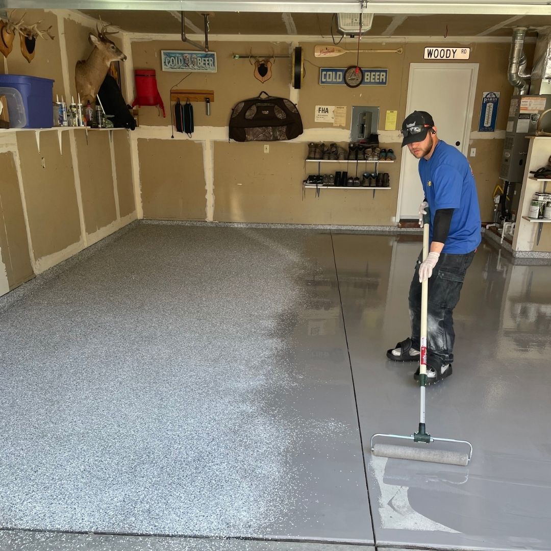 concrete overlay being applied to floor