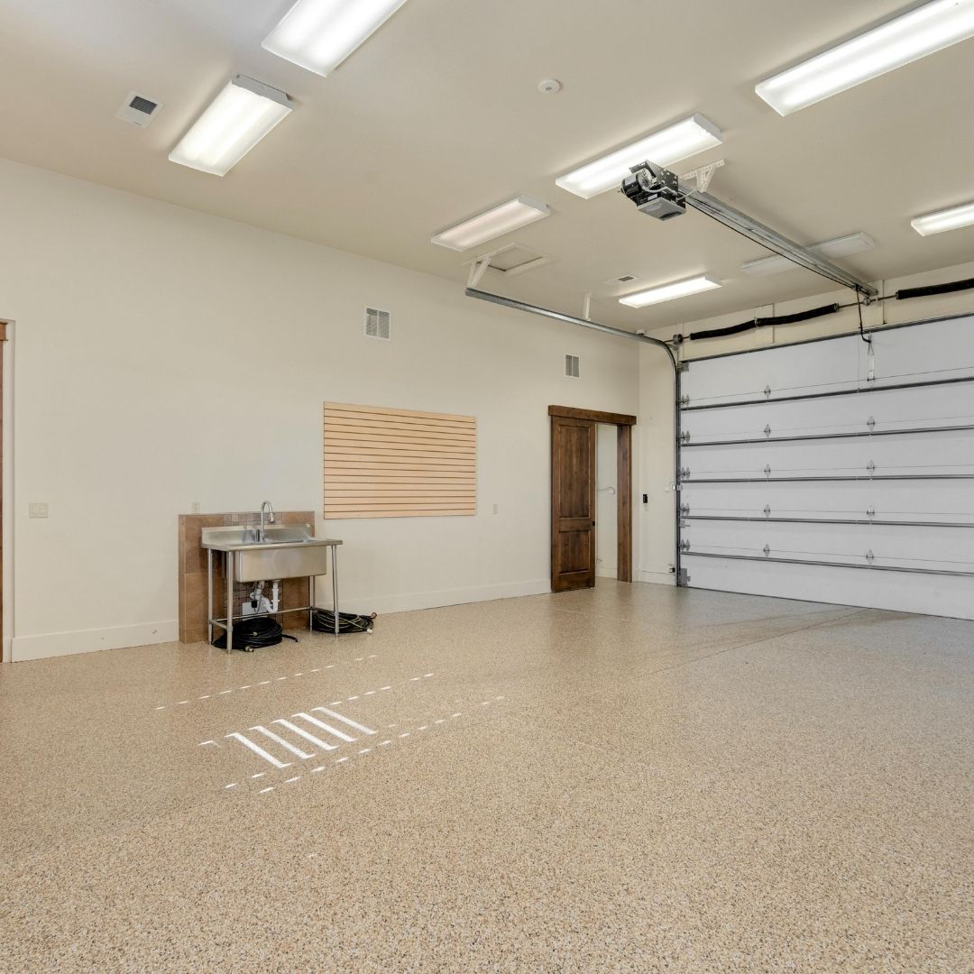 a garage with a clean coated floor